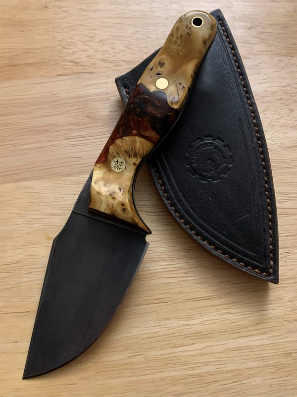 RRK-01-010, acid-etched blade with warm honey-toned burl handle, beside its dark leather sheath